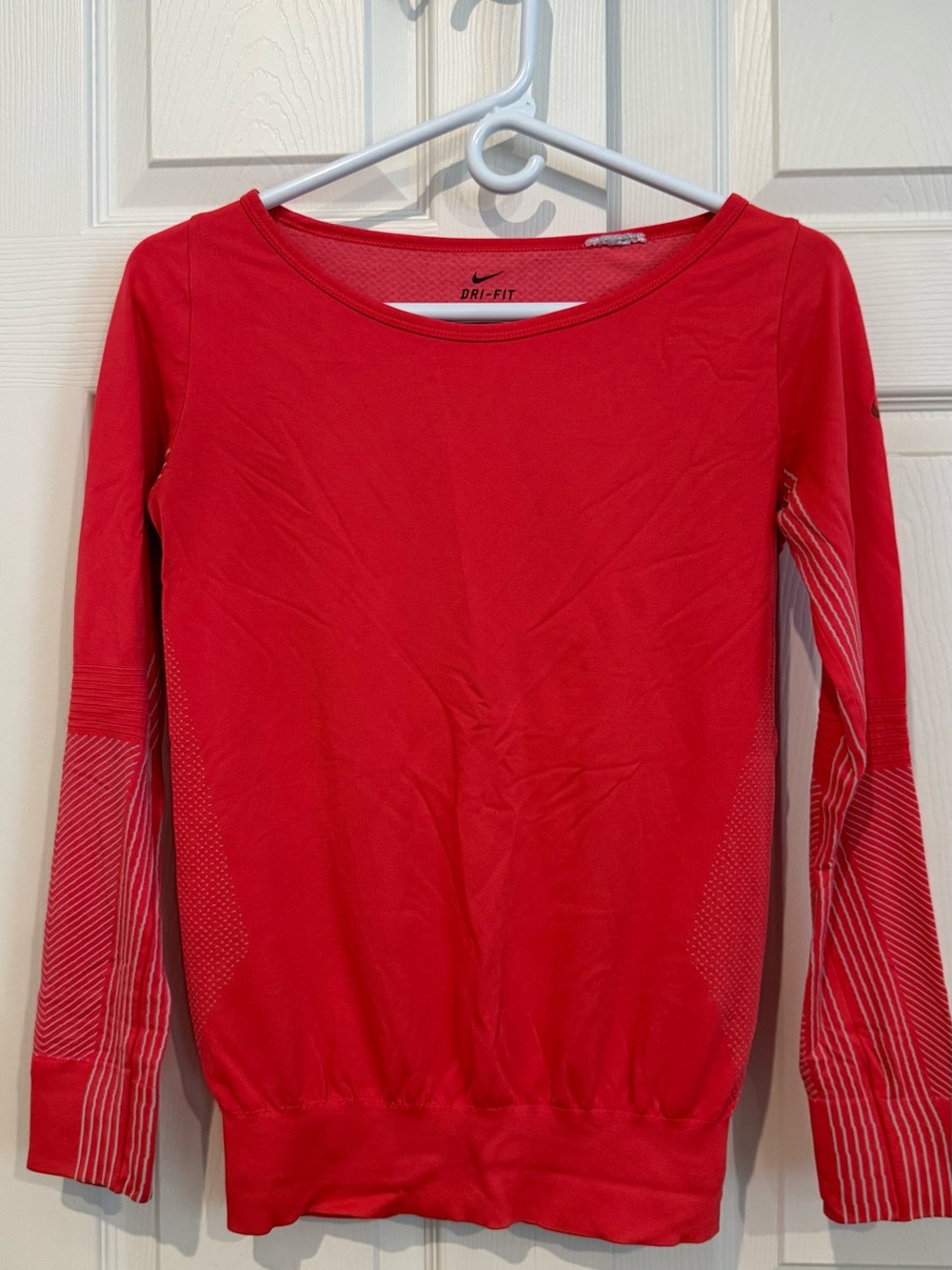 Nike Women’s Long Sleeve Dri-FIT Top in Neon Red